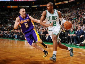 Leandro Barbosa #12 of the Boston Celtics drives to the basket against Steve Blake #5 of the Los Angeles Lakers on February 7, 2013 at the TD Garden in Boston, Massachusetts. (Brian Babineau/NBAE via Getty Images/AFP)