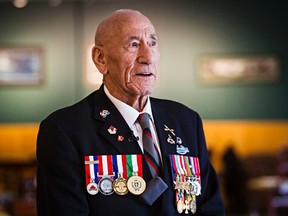 World War II veteran Maurice White speaks during a ceremony recognizing the 75th anniversary of the beginning of the Second World War at Brigadier James Curry Jefferson Armoury in Edmonton, Alta., on Wednesday, Sept. 10, 2014. Codie McLachlan/Edmonton Sun