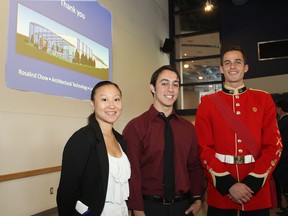 Rosalind Chow, left, took first place in a design competition for the National Wall of Remembrance, to be built at CFB Kingston, while Jonas Lobo and Justin Hanlon were runners-up. (Michael Lea/The Whig-Standard)