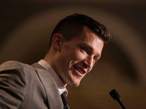 Edmonton Oilers captain Andrew Ference speaks to the Federal NDP caucus at the Fairmont Hotel MacDonald in Edmonton, Alta., on Wednesday, Sept. 10, 2014. Ference spoke about leadership and environmental responsibility. Ian Kucerak/Edmonton Sun