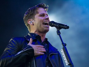 Mark Foster of Foster The People performs on stage during SONiC BOOM 2014 at Northlands in Edmonton, Alta., on Saturday, Aug. 30, 2014. The multi-artist show runs through Sunday, Aug. 31. Ian Kucerak/Edmonton Sun/ QMI Agency