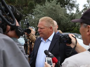 Doug Ford arrives at hospital on Thursday Sept. 11, 2014, to visit his brother Mayor Rob Ford. (DAVE THOMAS/Toronto Sun)