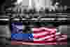 Members of the New York Police Department, Fire Department of New York and Port Authority Police Department carry an American flag at the beginning of the memorial observances held at the site of the World Trade Center in New York, September 11, 2014. Politicians, dignitaries and victims' relatives were gathering in New York, Washington and Pennsylvania on Thursday to commemorate the nearly 3,000 people killed in al Qaeda's attack on the United States 13 years ago on Sept. 11.  REUTERS/Andrew Burton/POOL