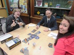 Some teens enjoying a game of “Zombies”  during the Cochrane Public Library free monthly game night.
