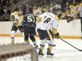 Sarnia Sting defenceman Connor Schlichting puts a puck on net during exhibition action against the London Knights on Saturday, Sept. 6. The Sting are set to take on the Windsor Spitfires in their last preseason contest at the RBC Centre on Friday, Sept. 12. Puck drop is set for 7:05 p.m. and $2 from every ticket sold will help benefit 'Little Miss Melody', a month-old Sarnia native who suffers from amyoplasia. (SHAUN BISSON/ THE OBSERVER/ QMI AGENCY​)