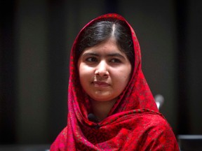 Pakistani schoolgirl activist Malala Yousafzai poses for pictures during a photo opportunity at the United Nations in the Manhattan borough of New York August 18, 2014.  REUTERS/Carlo Allegri