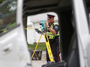 Belleville Police Const. Brad Stitt at the scene of an accident in this 2014 file photo.