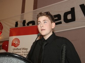 Oscar Evans, who had been blinded in a chemical accident two years ago, spoke Friday to the kick-off breakfast for the 2014 United Way campaign. FRI., SEPT. 12, 2014 KINGSTON, ONT. MICHAEL LEA\THE WHIG STANDARD\QMI AGENCY