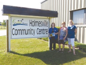 Alison Lobb, Janet Brunswick and Connie Brushett pose for a shot at the location of the upcoming show, the Central Huron Community Centre in Holmesville.