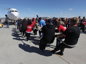 The United Way's 2014 campaign kicked off today with Plane Pull 11 at Red River College's Stevenson Campus. The Winnipeg Sun team was up first.