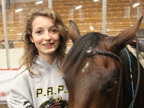 Mallorie Stanley Barr, 14, with her horse Dee at the Kingston Fall Fair, has been riding since she was just two years old. FRI., SEPT. 12, 2014 KINGSTON, ONT. MICHAEL LEA\THE WHIG STANDARD\QMI AGENCY