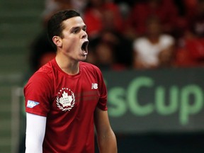 Milos Raonic celebrates winning his volley during Canada's Davis Cup World Group men's singles match against Alejandro Gonzalez of Colombia at the Metro Centre in Halifax, N.S., on Friday, Sept. 12, 2014. (Paul Darrow/Reuters)
