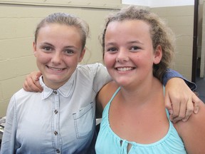 Sisters Anna and Sarah Doyle have been entering various categories at the Kingston Fall Fair for the past four years, as well as showing livestock in the 4-H Show. THURS, SEPT. 11, 2014 KINGSTON, ONT. MICHAEL LEA\THE WHIG STANDARD\QMI AGENCY