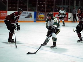 St. Thomas Stars forward Brett Van Dusen streaks between two Chatham Maroon defenders Friday at the Stars' home opener at the Timken Centre. The Stars are celebrating their 30th anniversary this season. (Ben Forrest, Times-Journal)