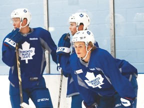 William Nylander (foreground) surveys the action at the Leafs’ rookie camp at MasterCard Centre on Friday. (Stan Behal/Toronto Sun)