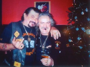 John (Boxer) Muscedere, left, at Christmas 2004 in Toronto with Wayne (Weiner) Kellestine, who was convicted of killing him and seven other Bandido gang members in April 2006 near Shedden, Ont. (Handout)