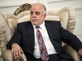 Iraqi Prime Minister Haider al-Abadi. AFP PHOTO/POOL/BRENDAN SMIALOWSKI