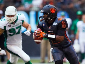 B.C Lions quarterback Kevin Glenn (2) throws the ball against the Saskatchewan Roughriders during the first half of their CFL football game in Vancouver, British Columbia, August 24, 2014.