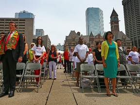 John Tory and Olivia Chow both attend an event for Portugal in Nathan Phillips Square on June 10, 2014. (Dave Abel/Toronto Sun)