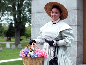 Shelby McCartney-Rundle, 18, shows off her attire as part of the Hillsdale Cemetery walking tour production on Saturday. BRENT BOLES/ QMI Agency