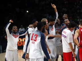 U.S. players celebrate winning their Basketball World Cup final game against Serbia in Madrid September 14, 2014.  (REUTERS)