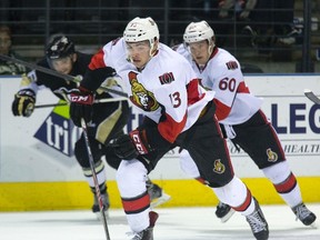Ottawa Senators centreman Nick Paul rushes up ice in the third period of their game at the 2014 Rookie Tournament in London, Ontario on Saturday, September 13, 2014.  The Penguins won the game, 4-3. DEREK RUTTAN/ The London Free Press /QMI AGENCY