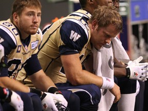 Winnipeg Blue Bombers’ quarterback Brian Brohm on the bench  during the second half of a CFL game against the BC Lions  in Vancouver, B.C. on Saturday September 13, 2014. (Carmine Marinelli/QMI Agency)