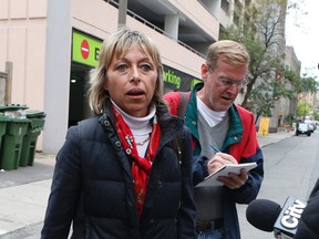 Mayor Rob Ford's wife, Renata, leaves Mt. Sinai Hospital where her husband is awaiting test results. The mayor was hospitalized following the discovery of a tumour in his lower abdomen. (JACK BOLAND, Toronto Sun)
