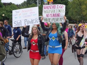 Marchers using chants, placards and – in some cases  – lingerie to make their points, took to downtown streets for the 4th annual Slut Walk aiming to fight victim-blaming in cases of sexual assault.
MEGAN GILLIS/OTTAWA SUN/QMI AGENCY