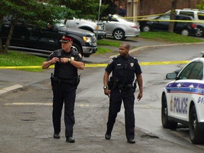 Police investigate a shooting in Ottawa’s Herongate neighbourhood that sent one man to hospital with an apparent gunshot wound to the face. The male victim is conscious, but Tuesday night was not co-operating with police, or even providing his name to investigators. Police are still searching for the other shooter after gunshots rang out near a rowhouse on 2850 Cedarwood Drive.
DANIELLE BELL/OTTAWA SUN/QMI AGENCY