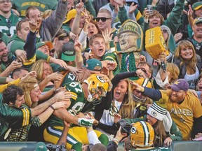 Green Bay Packers wide receiver Jordy Nelson takes the Lambeau Leap after scoring against the Jets on Sunday. (USA TODAY SPORTS)
