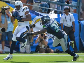 San Diego's Antonio Gates scores one of his three touchdowns against the Seahawks on Sunday. (USA TODAY SPORTS)
