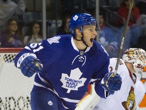 Maple Leafs prospect Connor Brown celebrates a goal by teammate Brett Findlay (not in picture) against Ottawa Senators rookies last night. Toronto lost 6-2. (Craig Glover/QMI Agency)