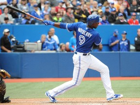 Toronto Blue Jays pinch-hitter John Mayberry Jr. connects for a home run against the Tampa Bay Rays in the ninth inning to tie the game at Rogers Centre on Sept. 14, 2014. (PETER LLEWELLYN/USA TODAY Sports)