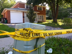 The home at 1 Axsmith Cres. where a man was fatally stabbed Sunday, Sept. 14, 2014. (DAVE ABEL/Toronto Sun)