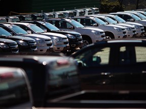 Vehicles sit parked in a lot at a General Motors vehicle factory in Sao Jose dos Campos July 30, 2014. (REUTERS/Roosevelt Cassio)