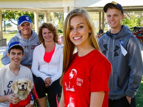 Taylor Bertelink of Foxboro stands in West Zwicks Island Park in Belleville after taking part in the Terry Fox Run Sunday.