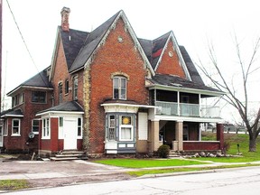 Frustrated with what they call a revolving door of criminal activity, neighbours have started a petition drive asking that an apartment building located at 595 Wallace St. in Wallaceburg be removed from control of the landowner. (DAVID GOUGH, QMI Agency)