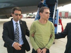 Luka Magnotta is pictured after arriving at Mirabel International airport in Mirabel, Que., in a Canadian military plane on June 18, 2012 (Courtesy SPVM)