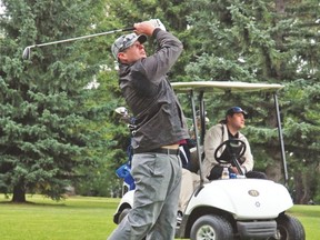 It was cool on Sept. 12 during the third annual Vulcan RCMP Golf Tournament, but not enough to dampen enthusiasm for the event. Landon King, an RCMP constable in Calgary, tracks his ball on fairway No. 3 after driving it to the green. He was one of about 140 people who came out to support the annual event, which raises funds for the Vulcan Regional Victims Services Society.