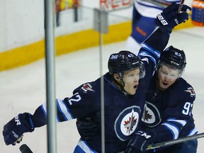 Winnipeg Jets Nikolaj Ehlers celebrates his game-tying goal against the Edmonton Oilers with teammate Ben Walker during the 2014 Young Stars Classic Tournament in Penticton, B.C. on Monday September 15, 2014. Al Charest/Calgary Sun/QMI Agency