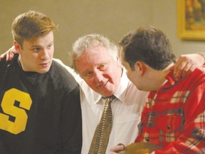 James Roberts, left, as Biff Loman, Rob Faust as his father Willy Loman, and Marshall Lemon as Happy Loman star in London Community Players? production of Arthur Miller?s Pulitzer Prize-winning masterpiece Death of a Salesman, opening at the Palace Theatre?s Procunier Hall on Thursday. (ROSS DAVIDSON )