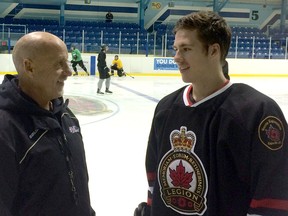 Sarnia Legionnaires head coach Dan Rose, left, welcomes new defenceman Jake O'Donnell to the hockey club during a practise Monday. O'Donnell, widely regarded as one of the best 16-year-old rearguards in Ontario, will suit up for the Legionnaires Thursday when they host the London Nationals.
Submitted photo by Anne Tigwell