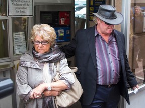 Diane and Randy Ford, mother and brother of Toronto Mayor Rob Ford, finish paying for parking across the street from Mount Sinai Hospital in Toronto on Monday, September 15, 2014. (Ernest Doroszuk/Toronto Sun)