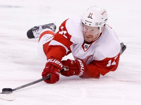 Detroit Red Wings right winger Daniel Alfredsson shoots from the ice during the second period against the Boston Bruins in Game 2 of the first round of the 2014 NHL playoffs at TD Garden on April 20, 2014. (Greg M. Cooper/USA TODAY Sports)