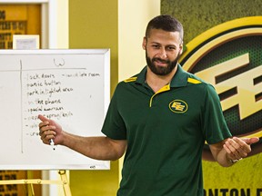 Eskimos QB Mike Reilly speaks to Edmonton Huskies players during Leading Change: The Alberta CFL Project at the Edmonton Huskies Field House on Monday.