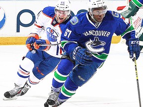 Belleville Bulls D-man Jordan Subban carries the puck for the Vancouver Canucks prospects during the 2014 Young Stars Classic in Penticton, BC. (Vancouver Canucks photo)