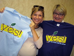 Oxford school nutrition co-ordinator Lynda Metcalfe and Stephanie Segave regional manager of the Ontario Student Nutrition Program show off T-shirts that are part of a campaign to raise awareness about the importance of good food in schools. (HEATHER RIVERS, Sentinel-Review)