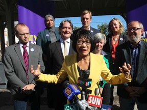 Toronto mayoral candidate Olivia Chow gets the backing of influential city councillors Mike Layton, (front from left) Gord Perks, Sarah Doucette and Joe Mihevc at press conference Tuesday September 16, 2014. Also on hand were council candidates (back from left) Ausma Malik, Joe Cressy and Marit Stiles. (Stan Behal/Toronto Sun)