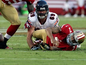 Niners quaretrback Colin Kaepernick fumbles the ball against the Chicago Bears on Sunday. (USA TODAY SPORTS)